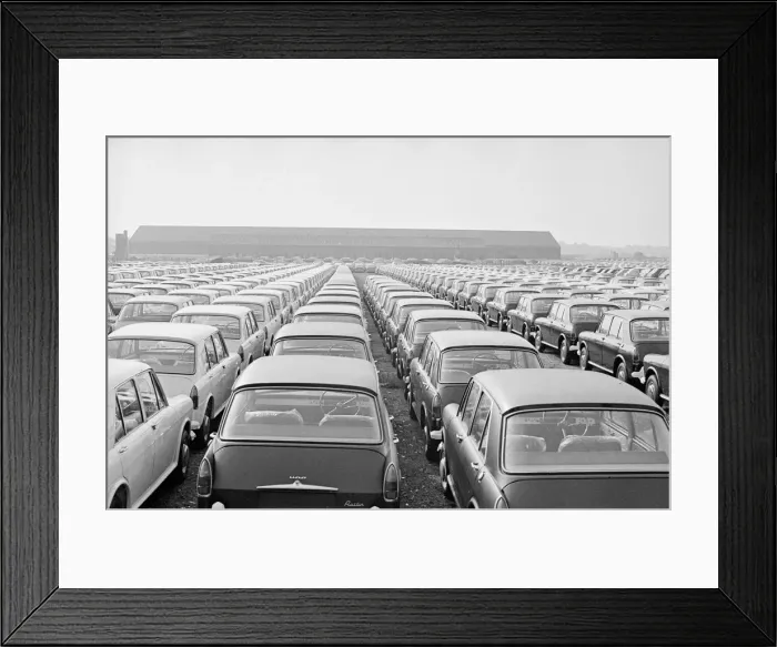 Framed Print : Thousands of new produced Austin cars stored on Wythnal Airfield shorlty after coming off Framed Print : Thousands of new produced Austin cars stored on Wythnal Airfield shorlty after coming off