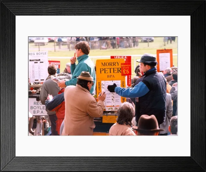 Framed Print : A bookie changing the odds at the racetrack in April 1995 Framed Print : A bookie changing the odds at the racetrack in April 1995