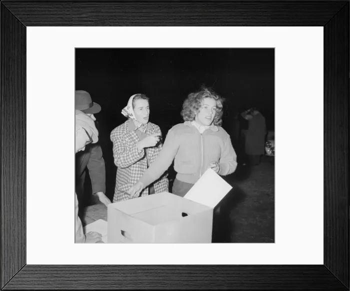 Framed Print : British racing drivers Pat Moss and Ann Wisdom check in looking tired after finishing Framed Print : British racing drivers Pat Moss and Ann Wisdom check in looking tired after finishing
