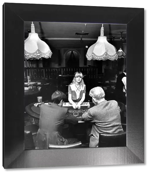 Sherrill Crabtree deals the cards at the Black jack tables in the newly opened Casino