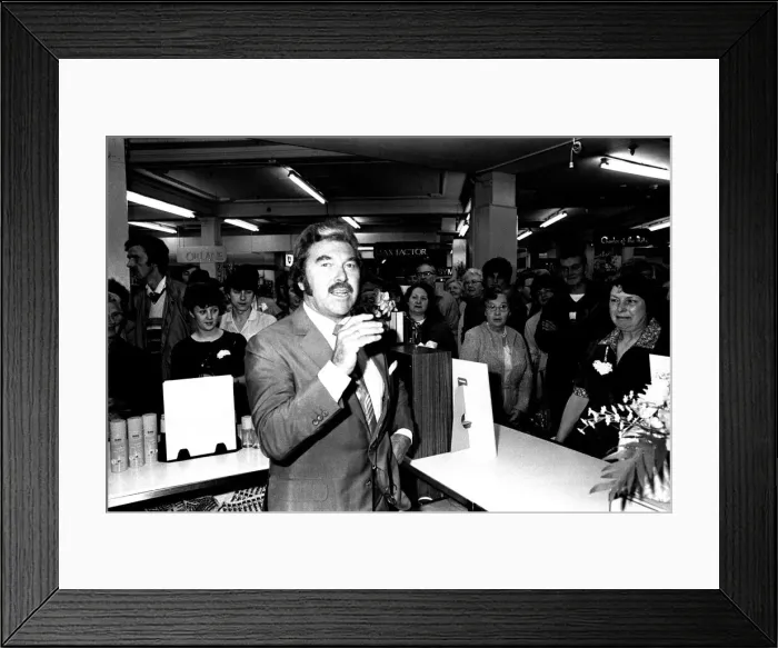 Framed Print : TV sports personality Dickie Davies was a guest of honour at Binns department store in