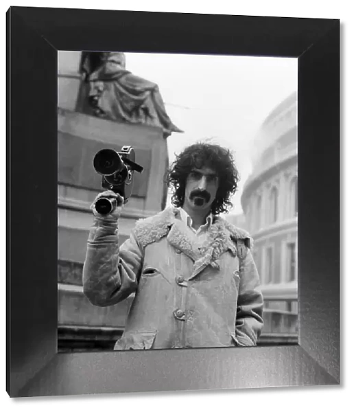 Frank Zappa and his movie camera at the Royal Albert Hall. February 1971 71-12000-001