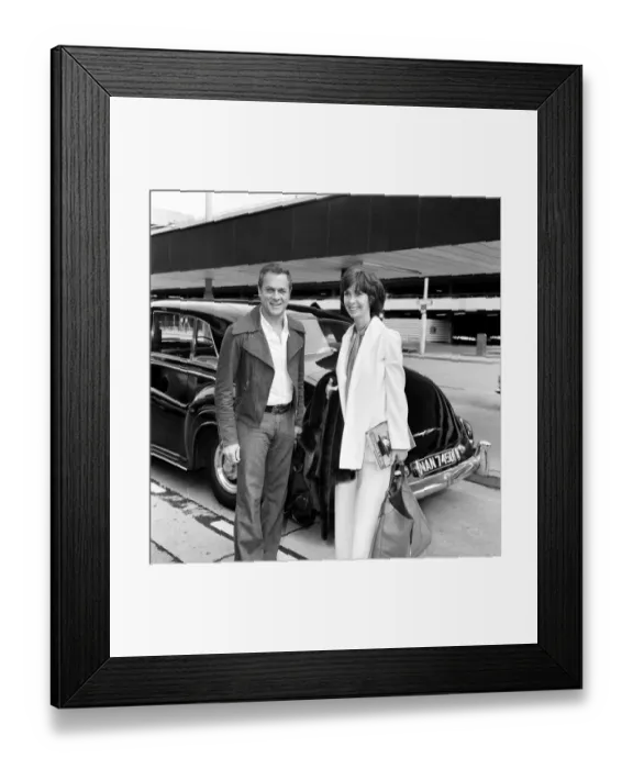 Framed Print : American film actor Tony Curtis and wife Lesley at Heathrow airport