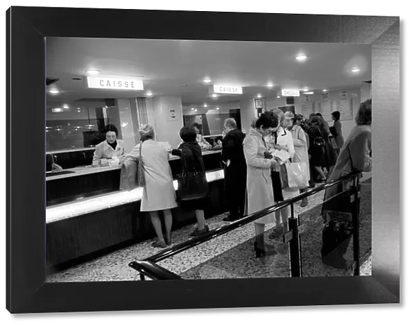 Local people queuing at a bank in Paris, France April 1975 75-2079-012