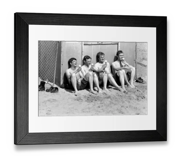 Framed Print : Four men sitting enjoying an ice cream in the hot weather at Margate Beach Framed Print : Four men sitting enjoying an ice cream in the hot weather at Margate Beach