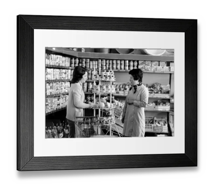 Framed Print : French housewife Mrs Maria Quaranta at the local supermarket, shopping for food