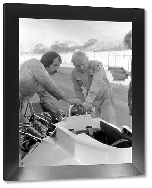 Racing driver John Surtees trying his new car. January 1976 76-00088