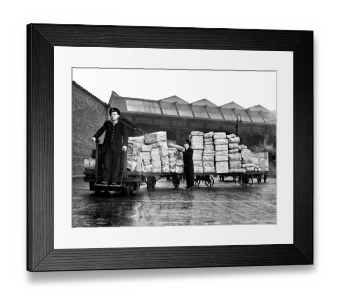 Framed Print : Truckloads of Xmas parcels on platform 17 of Victoria Station with parcel Porter Jim Framed Print : Truckloads of Xmas parcels on platform 17 of Victoria Station with parcel Porter Jim