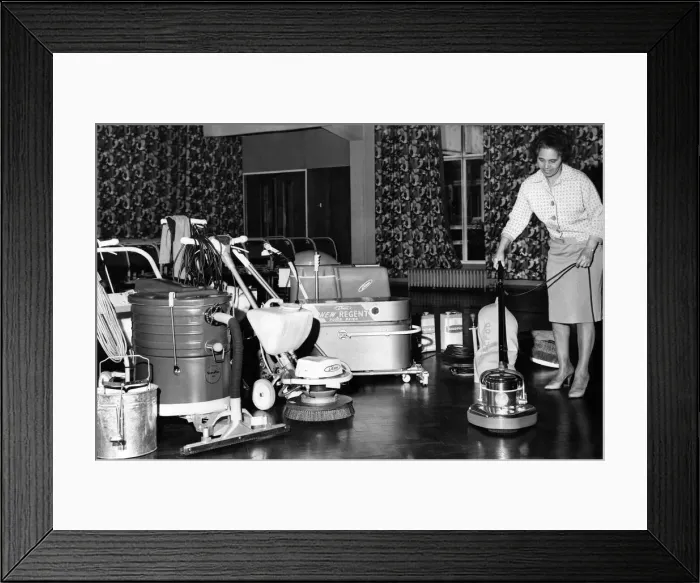 Framed Print : School charwoman Mrs Mabel McKennas gets her first glimpse of the automatic school