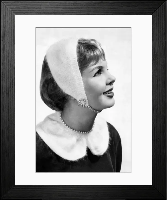 Framed Print : Reveille Fashions. Mannequin modeling a knitted head scarf January 1959 P006941 Framed Print : Reveille Fashions. Mannequin modeling a knitted head scarf January 1959 P006941