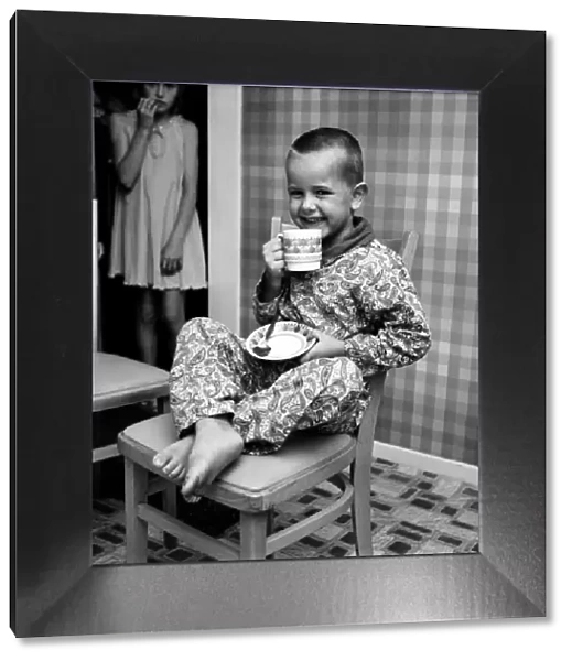Humour: Unusual: Boy trapped in fridge. July 1970 70-6760-002