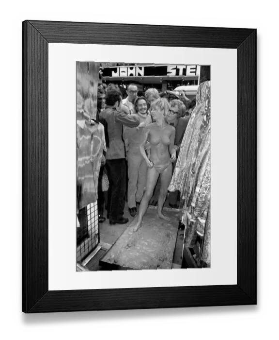 Framed Print : Glamour: Unusual: Helen Jones lies in tray of cement (Carol) Framed Print : Glamour: Unusual: Helen Jones lies in tray of cement (Carol)