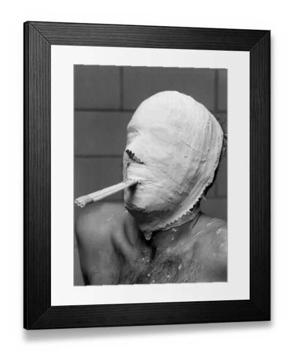 Framed Print : Tubes in his mouth help Ice Hockey goal minder Leif Holmquist to breathe as he waits for Framed Print : Tubes in his mouth help Ice Hockey goal minder Leif Holmquist to breathe as he waits for