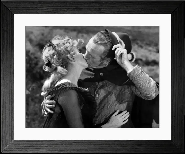 Framed Print : Mr. David Niven, the ever-willing pupil, obeys his masters bidding Framed Print : Mr. David Niven, the ever-willing pupil, obeys his masters bidding