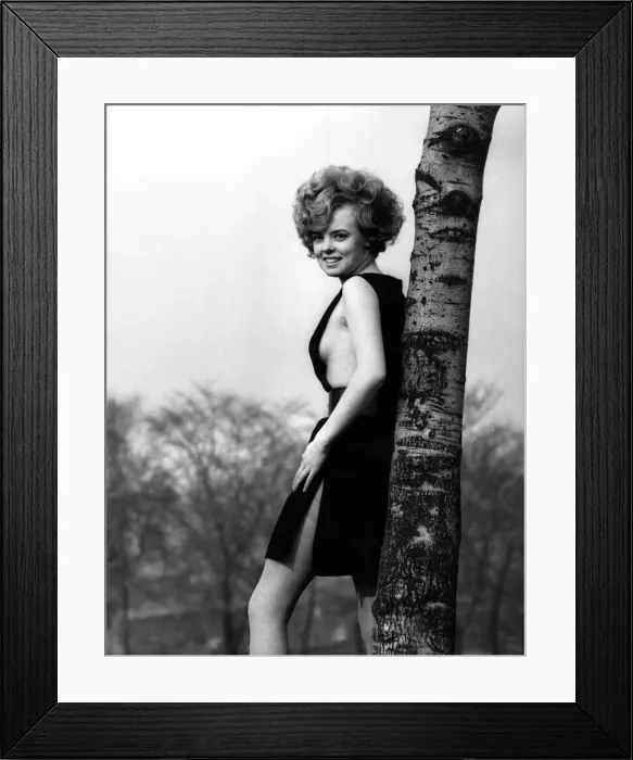 Framed Print : Mini-length, split skirt, no sides and the dress is appropriately titled Shock Framed Print : Mini-length, split skirt, no sides and the dress is appropriately titled Shock