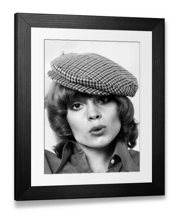 Framed Print : Model Amanda tries a cloth cap. May 1973 P007870 Framed Print : Model Amanda tries a cloth cap. May 1973 P007870