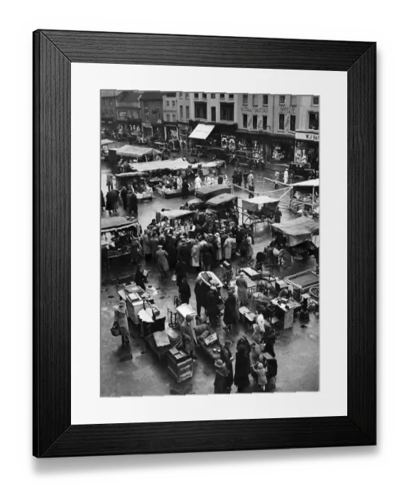 Framed Print : Market Day in the market place at Newbury, Berkshire. December 1935. P007940