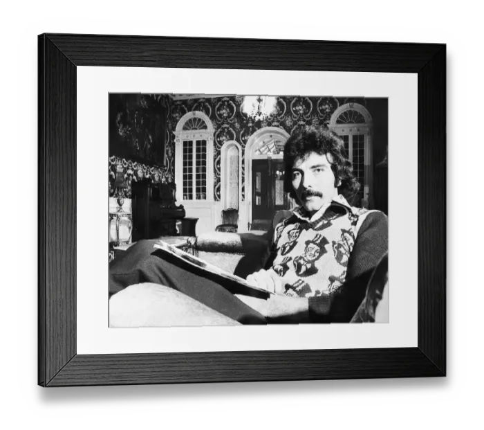 Framed Print : Tony Iommi Lead singer of pop group Black Sabbath at home October 1975 Framed Print : Tony Iommi Lead singer of pop group Black Sabbath at home October 1975