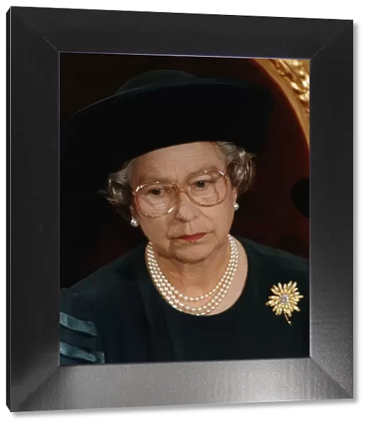 Queen Elizabeth wearing glasses Recent family problems take their toll on her