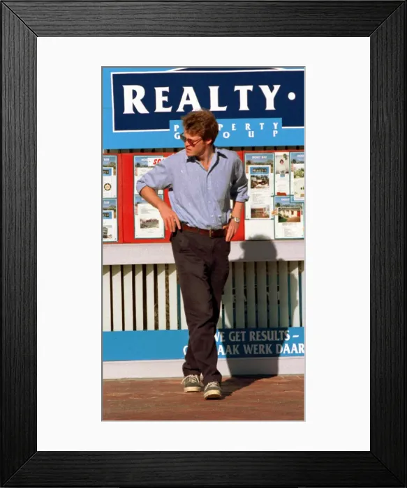 Framed Print : Earl Spencer looks in the Windows of the estate agents in South Africa Framed Print : Earl Spencer looks in the Windows of the estate agents in South Africa