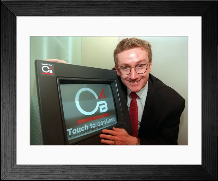 Framed Print : Fred Goodwin, chief executive of the Clydesdale Bank, pictured at their new branch in St
