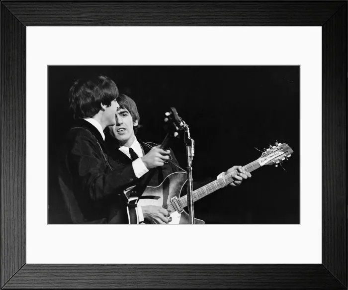 Framed Print : Beatles members Paul McCartney and George Harrison in concert on the second night of Framed Print : Beatles members Paul McCartney and George Harrison in concert on the second night of