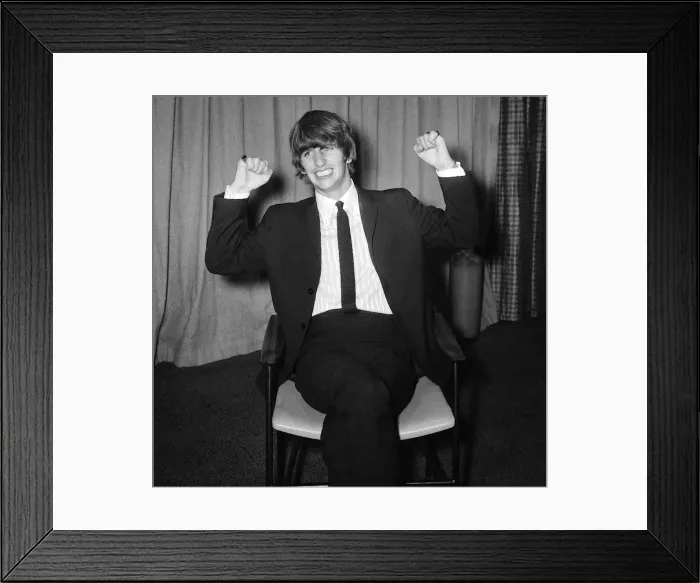 Framed Print : Beatles Files 1963 Ringo Starr sitting on chair, stretching. August 1963