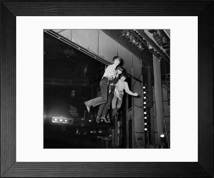 Framed Print : The Beatles members left to right George Harrison, Paul McCartney