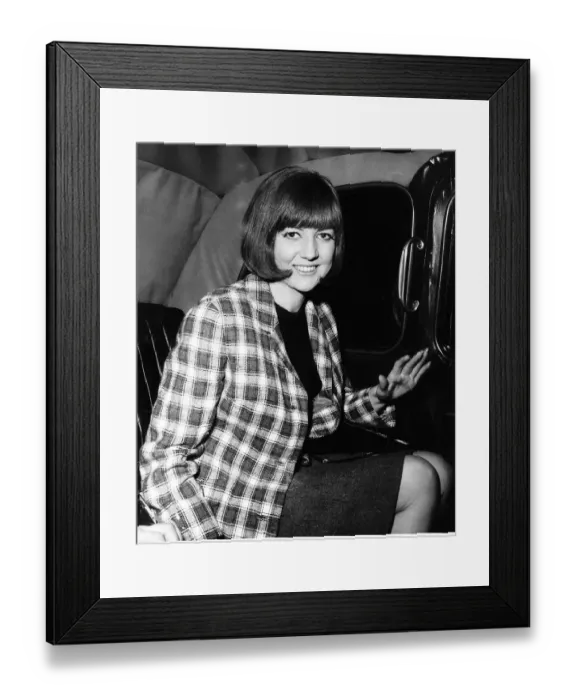 Framed Print : Cilla Black TV Personality and former pop star inside a taxi May 1964