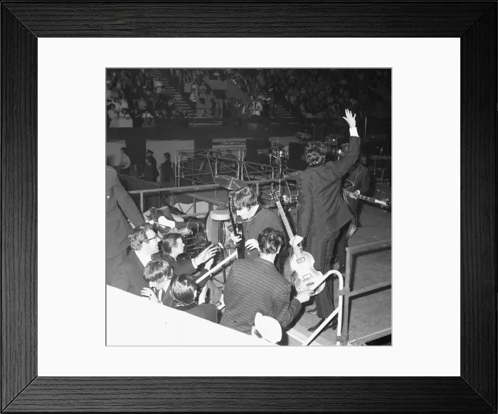 Framed Print : Paul McCartney waving and John Lennon leaving the stage at the NME poll winners all star Framed Print : Paul McCartney waving and John Lennon leaving the stage at the NME poll winners all star