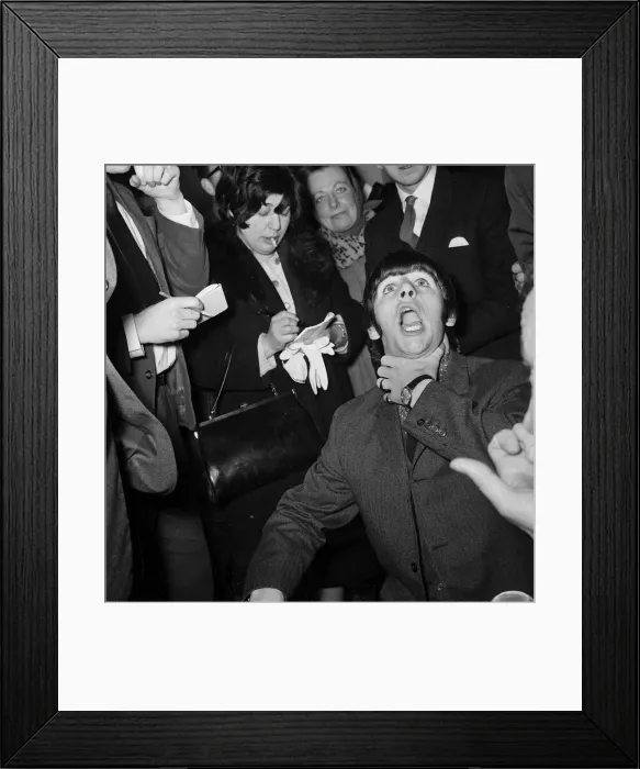 Framed Print : Beatles drummer Ringo Starr shows off his tonsils to the press before entering Framed Print : Beatles drummer Ringo Starr shows off his tonsils to the press before entering