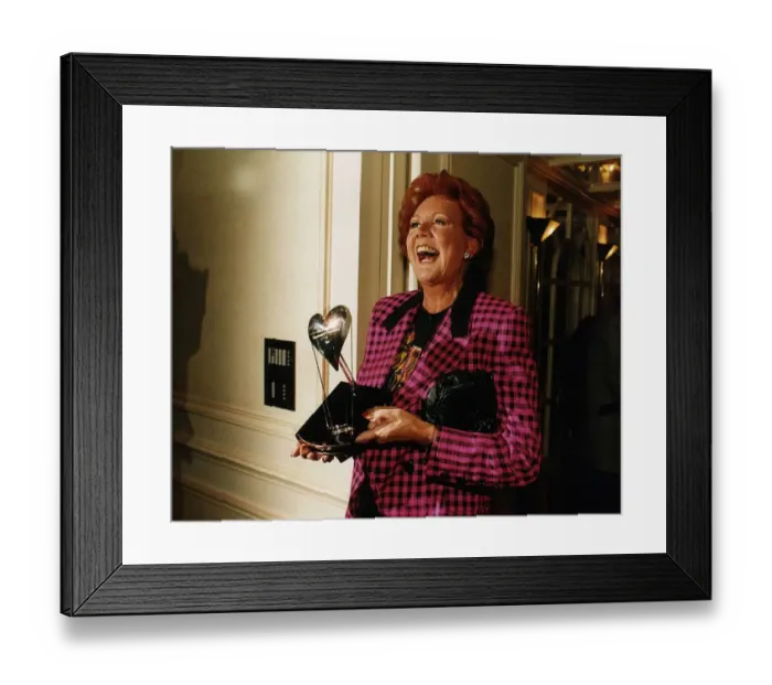 Framed Print : Cilla Black, dressed in a black and pink chequered jacket