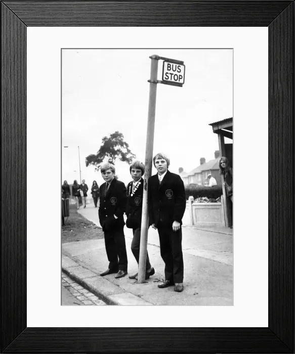 Framed Print : Paul Downey (left) with his friends Ian and Keith Van-Hoof waiting for a bus that never