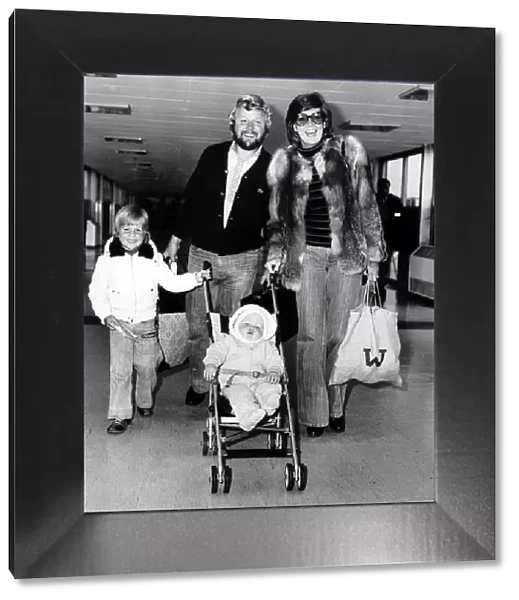 Bobby Willis husband of singer Cilla Black with their children at London airport