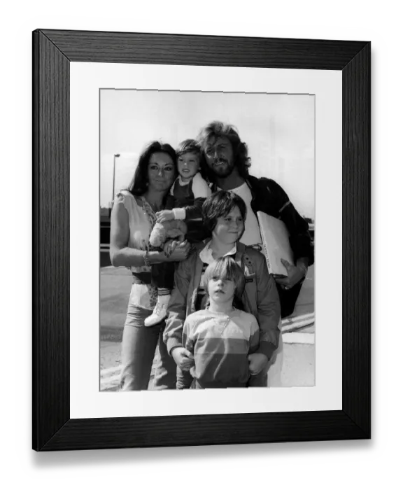 Framed Print : Bee Gees singer Barry Gibb and family at Heathrow Airport