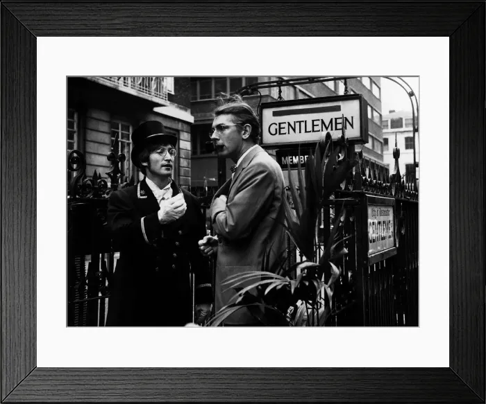 Framed Print : Comedian Peter Cook stands in Carnaby Steet during the filming of sketch for