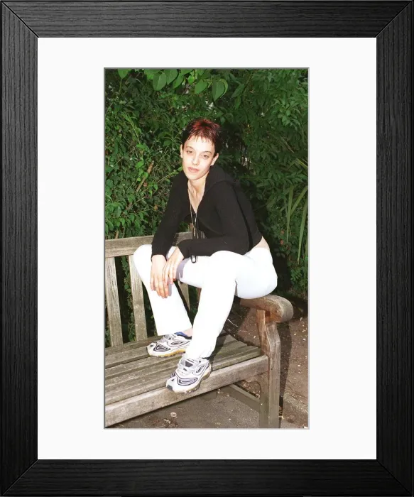 Framed Print : Grace Peters illigitimate daughter of Keith Allen July 1999 sitting on a bench Framed Print : Grace Peters illigitimate daughter of Keith Allen July 1999 sitting on a bench