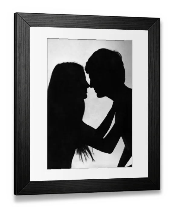 Framed Print : Love and Romance silhouette of a couple about to embrace - kiss Feburary 1979 Framed Print : Love and Romance silhouette of a couple about to embrace - kiss Feburary 1979