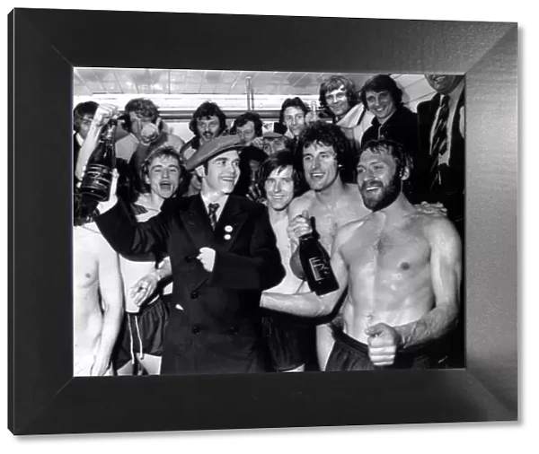 Graham Taylor (Top right) and the Watford team celebrate in the dressing room after