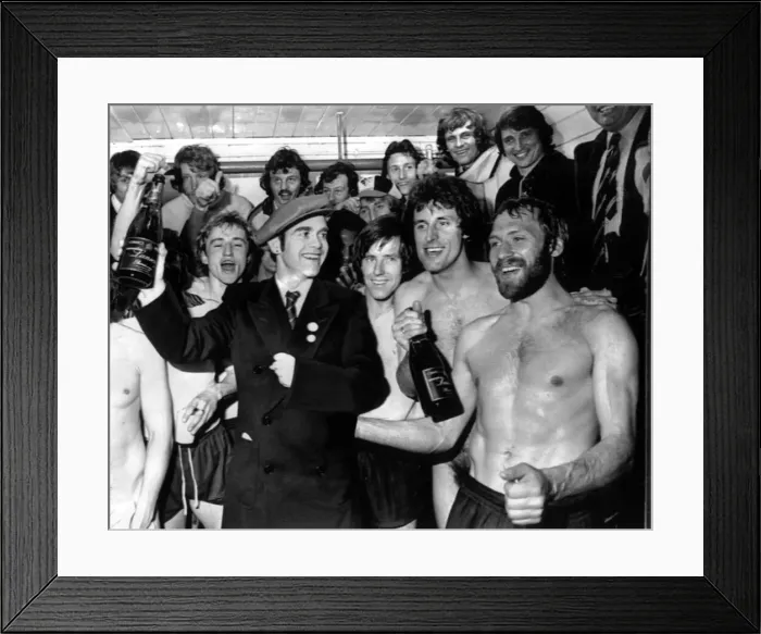Framed Print : Graham Taylor (Top right) and the Watford team celebrate in the dressing room after