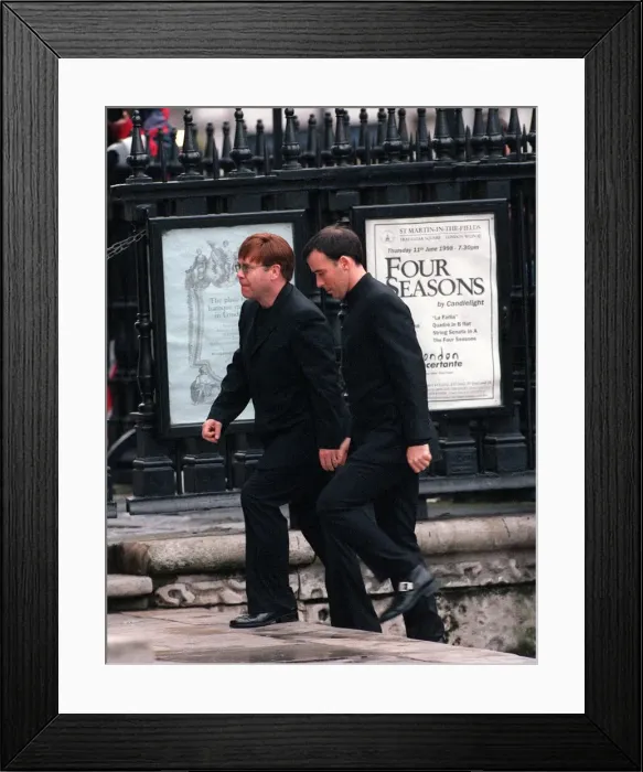Framed Print : Sir Elton John and David Furnish at memorial service 1998 for Linda McCartney Framed Print : Sir Elton John and David Furnish at memorial service 1998 for Linda McCartney