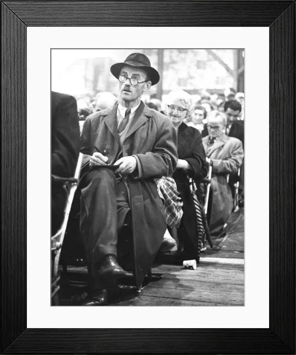 Framed Print : An old gentleman looks up hopefully whilst marking his card during a Bingo session Framed Print : An old gentleman looks up hopefully whilst marking his card during a Bingo session