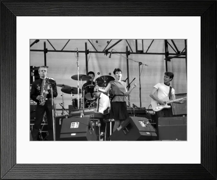 Framed Print : Hazel O Connor performs on stage with her band Megahype at the outdoor concert in Framed Print : Hazel O Connor performs on stage with her band Megahype at the outdoor concert in