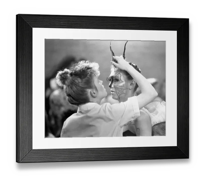 Framed Print : A student puts the final touches to The Insect hair style in a hair Framed Print : A student puts the final touches to The Insect hair style in a hair
