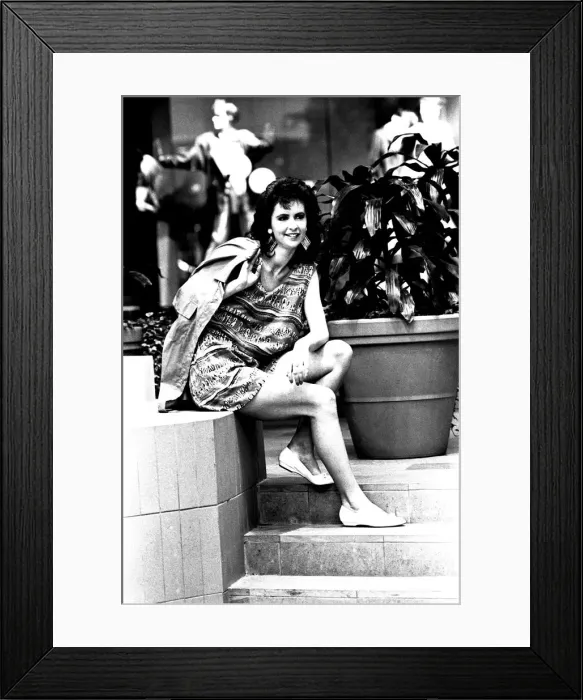 Framed Print : A model wearing a shirt and shorts in March 1987 Framed Print : A model wearing a shirt and shorts in March 1987