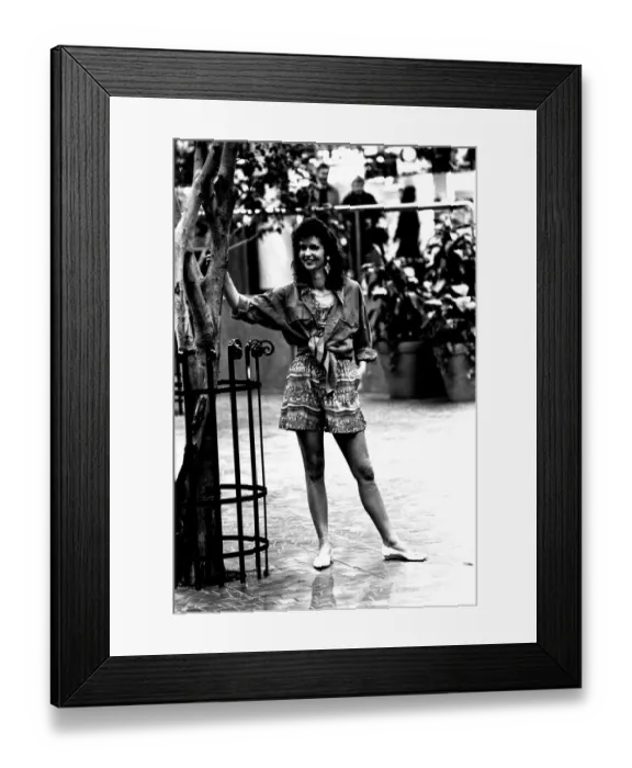 Framed Print : A model wearing a shirt and shorts in March 1987 Framed Print : A model wearing a shirt and shorts in March 1987