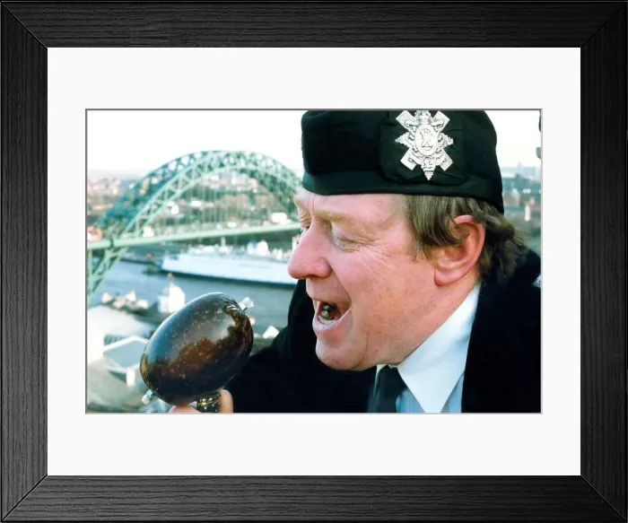 Framed Print : Piper Derek elliott samples a locally grown haggis in January 1994 Framed Print : Piper Derek elliott samples a locally grown haggis in January 1994