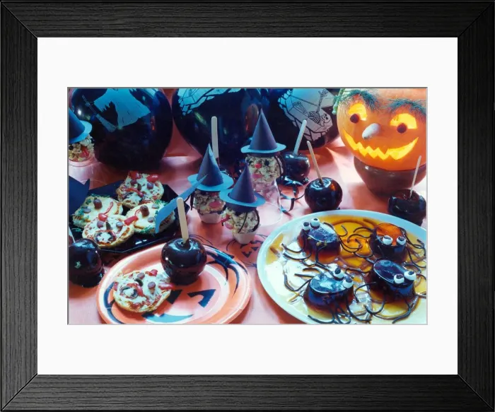 Framed Print : Some party food for Halloween in 1993. Some black toffee apples, spider jellies