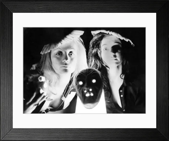 Framed Print : These two girls are dressed to kill for a Halloween party in November 1972 Framed Print : These two girls are dressed to kill for a Halloween party in November 1972
