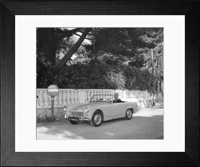 Framed Print : Daily Herald motor racing correspondent Thomas H Wisdom sitting at the wheel of a new Framed Print : Daily Herald motor racing correspondent Thomas H Wisdom sitting at the wheel of a new